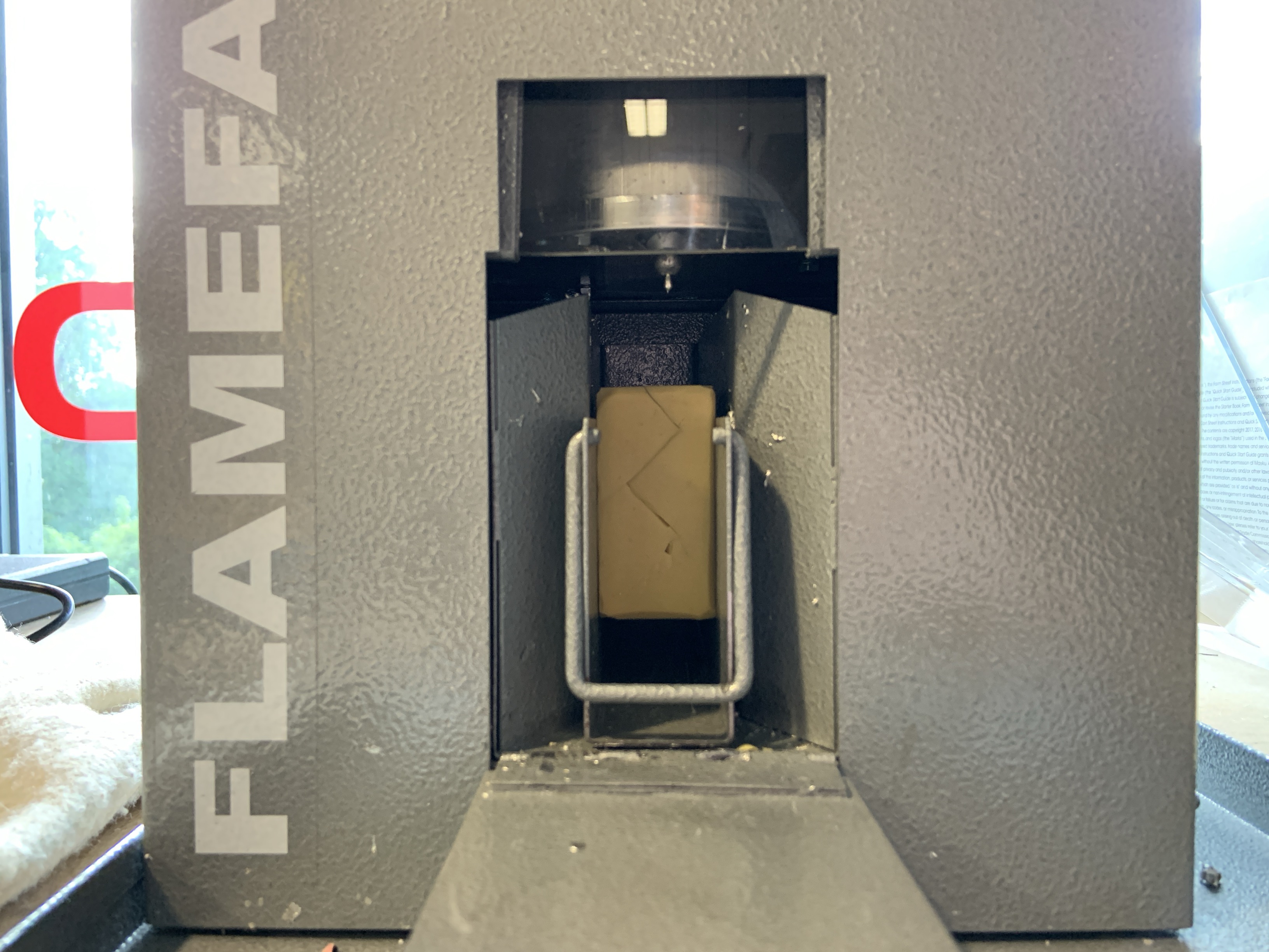 Load tray into caster